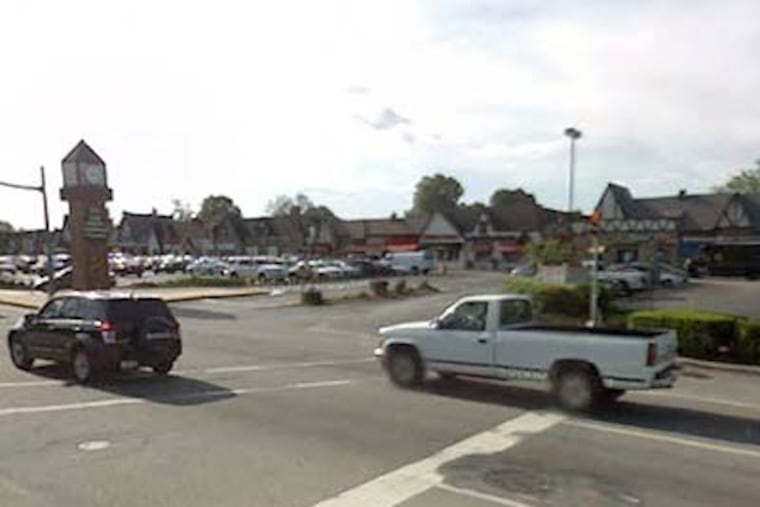 Police say Sean Burton, a Delaware County business owner, stabbed James Stropas to death last week in the parking lot of the Olde Sproul Shopping Village in Springfield. (Google Earth)