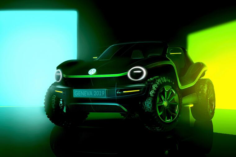 This undated picture provided by the Volkswagen car manufacturer shows a Volkswagen ID Buggy electric car. The new Buggy will be presented at the Geneva International Motor Show, which takes place in Geneva, Switzerland, from March 7 until March 17, 2019. Automakers are rolling out new electric and hybrid models at the show as they get ready to meet tougher emissions requirements in Europe - while not forgetting the profitable and popular SUVs and SUV-like crossovers. (Volkswagen via AP)
