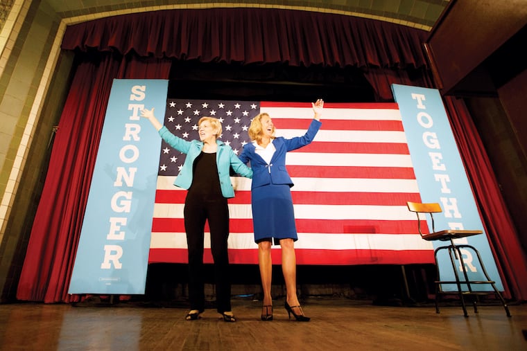 Sen. Elizabeth Warren praised Katie McGinty as a teammate to Hillary Clinton, and tried to link Sen. Pat Toomey to Donald Trump.