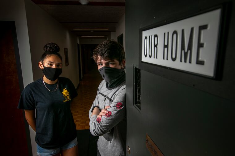 Anna Thomas, 18, and Dylanger Thomas-Brodsky Johnson, 18, at the entrance to dorm-style rooms at St. Joseph's House, a former convent in West Oak Lane for college students experiencing homelessness.
