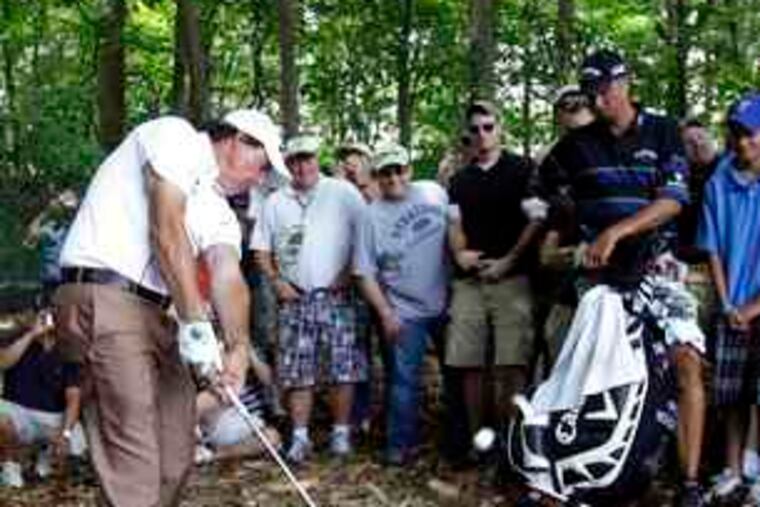 Phil Mickelson hits out of the rough during practice for the U.S. Open at Bethpage Black. Tournament officials should resist calls to make the course "a fairer test."