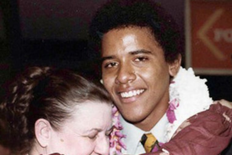 An undated photo of Barack Obama (below) with his grandparents, Stanley Armour Dunham and Madelyn Lee Payne Dunham, while he was a student at Columbia University.