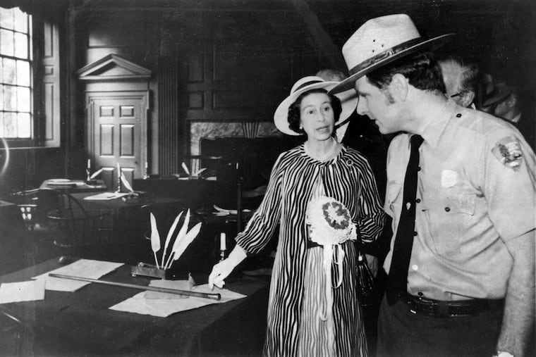 Queen Elizabeth II at Independence Hall with Hobart Cawood (right) of the National Park Service during her bicentennial visit to Philadelphia in 1976.