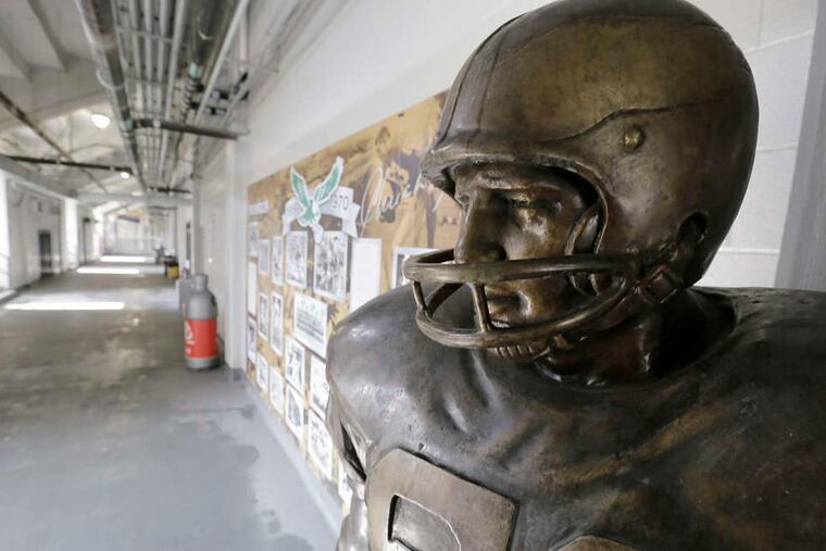 ELIZABETH ROBERTSON / STAFF PHOTOGRAPHER The Chuck Bednarik statue at Penn's Franklin Field.