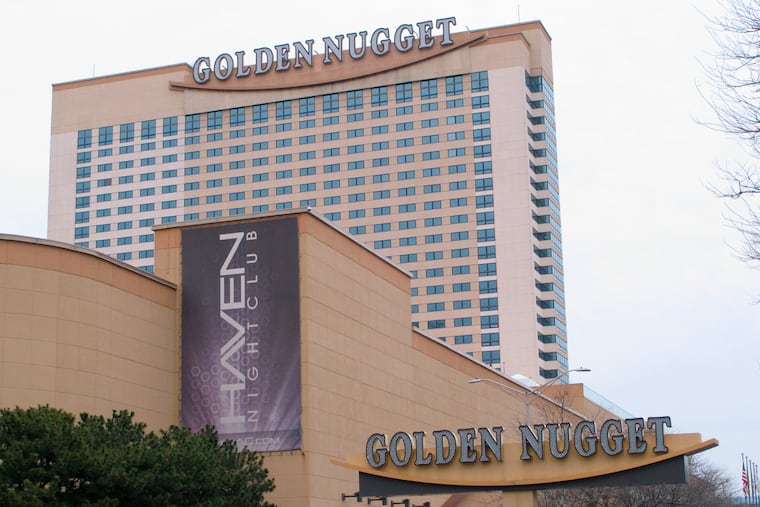 This Feb. 22, 2019 photo shows the exterior of the Golden Nugget casino in Atlantic City, N.J. New Jersey lawmakers are considering loosening their sports betting restrictions to allow the owner of the Golden Nugget casino to accept bets on most National Basketball Association teams. (AP Photo/Wayne Parry)