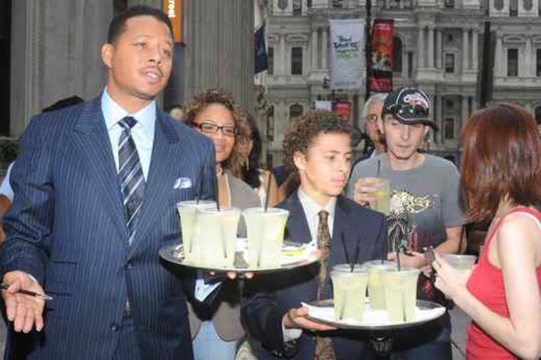 Actor Terrence Howard and son Hunter sell lemonade outside the Ritz-Carltonin Center City for a charity- Alex's, not Electrolux's. (See "Feeling the squeeze.")
