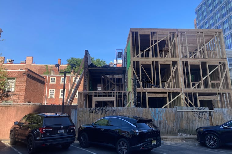 The new additions being added to the rear of some of the houses on the 100 block of North Mole Street.