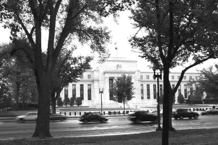 The U.S. Federal Reserve (above) and financial institutions such as AIG (left) are both mentioned in Democratic and Republican goals for changes to avoid a repeat of the current economic crisis.