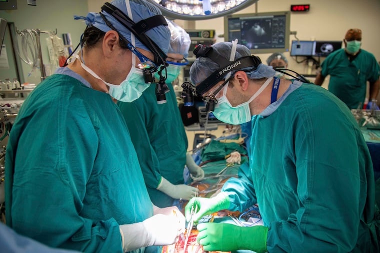 Surgeons perform a heart transplant on a patient at Duke University Hospital in Durham, N.C., in 2022. More than 100,000 people in the U.S. are registered to get organ transplants, far exceeding availability, Julia Shipley writes.