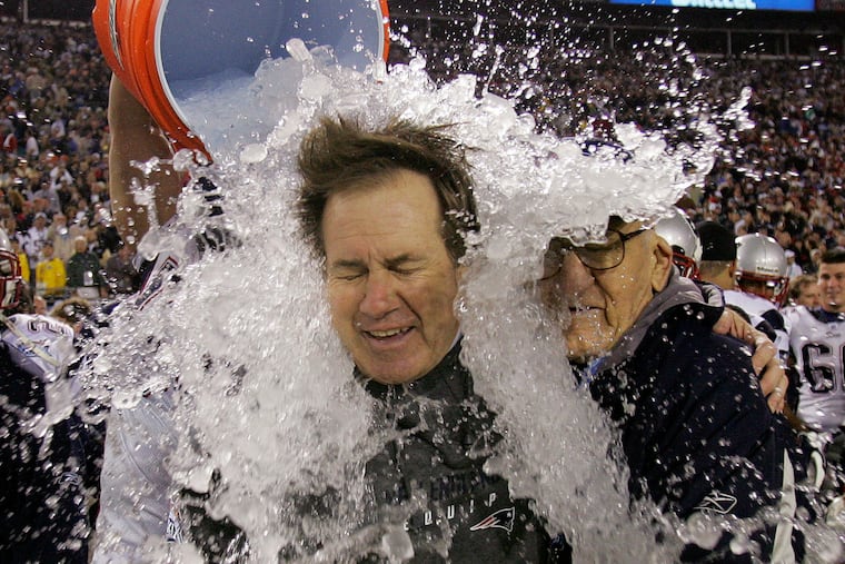 Patriots head coach Bill Belichick is doused after the Patriots beat the Eagles, 24-21, in Super Bowl XXXIX. Belichick's hopes of being a first-ballot Hall of Famer got a similar treatment, as cheating scandals involving the Patriots appear to have kept him out — for now.