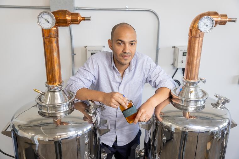 Francisco Garcia, 32-year-old Dominican distiller, at Strivers' Row Distillery. He distills out of his space located inside Maken Studios, 3401 I Street, Philadelphia. Photograph taken on Monday, June 6, 2022.