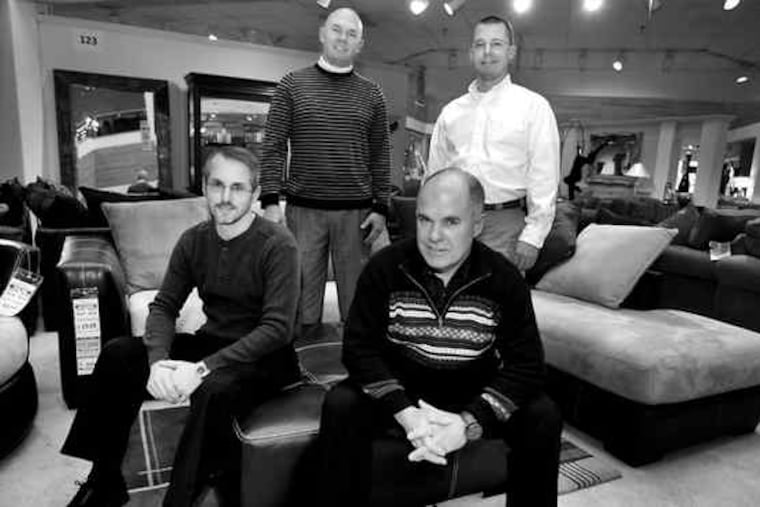 The recession's latest casualty is Oskar Huber Fine Furniture, run by the founder's four grandsons (from left at the Southampton store) Ron, Don, Bob and Glenn Huber. They've filed for bankruptcy.