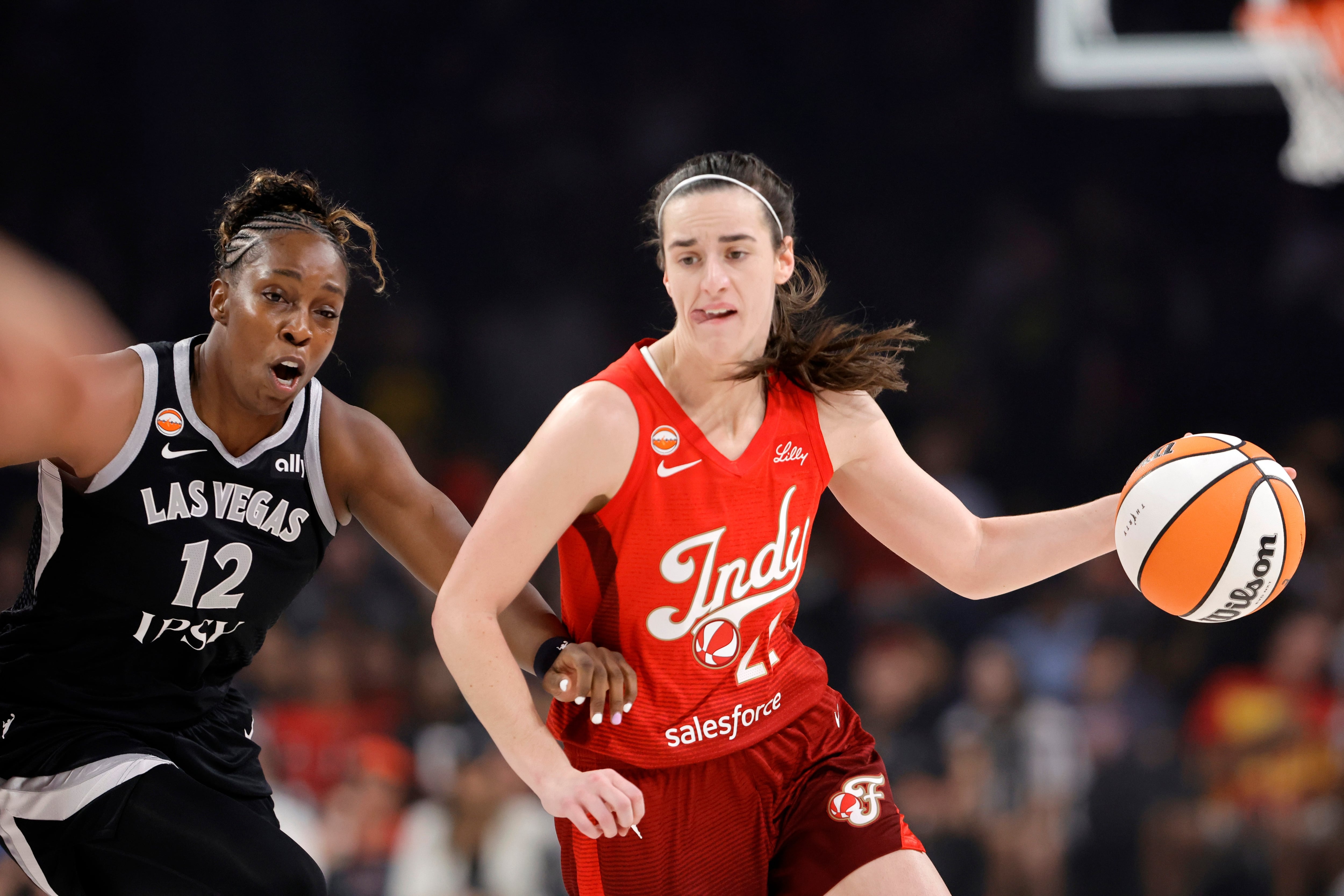 Caitlin Clark has 45 points, 10 assists for the WNBA's first 40-10 game as Fever beat Storm