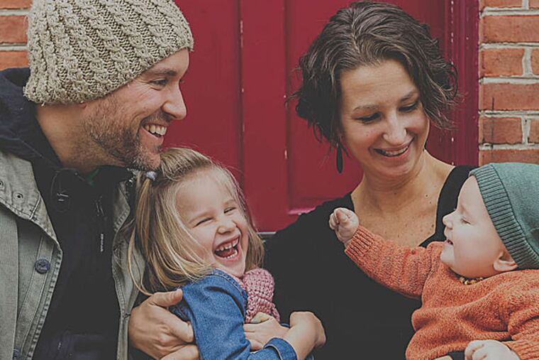 The Bradshaw family, from left: Phil, Rayna, Tammy, and newest member Ember, born March 24, 2014.