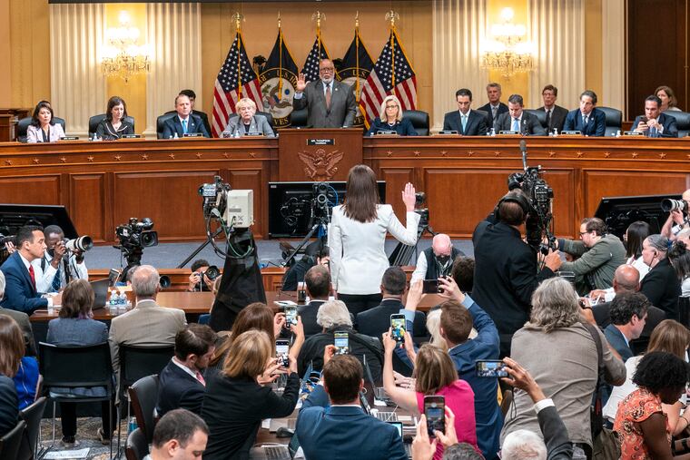 Cassidy Hutchinson, former aide to Trump White House chief of staff Mark Meadows, is sworn in by Chairman Bennie Thompson, D-Miss., as the House select committee investigating the Jan. 6 attack on the U.S. Capitol holds a hearing at the Capitol in Washington, on Tuesday.