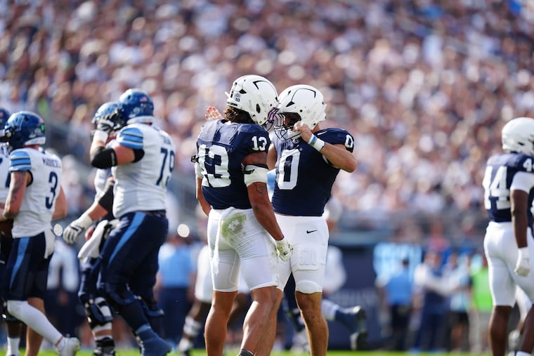 Penn State linebackers Tony Rojas (13) and Dominic DeLuca celebrate during the team's win over Villanova on Saturday. Up next: No. 6 Oregon.
