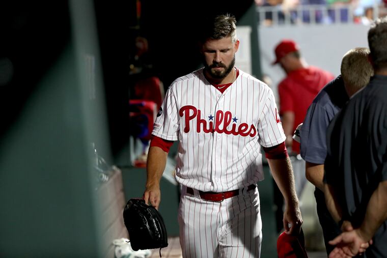 Adam Morgan walked through the dugout after leaving the game against the Giants on Wednesday night.