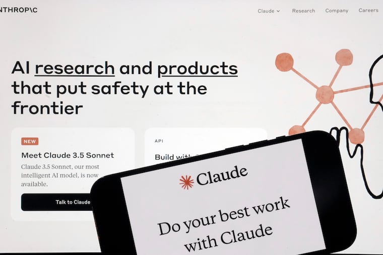 The Anthropic website and mobile phone app are shown in this photo from July 2024.