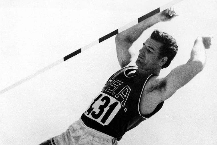 Don Bragg performs a pole vault during the 1960 Olympics in Rome, in which he won a gold medal.