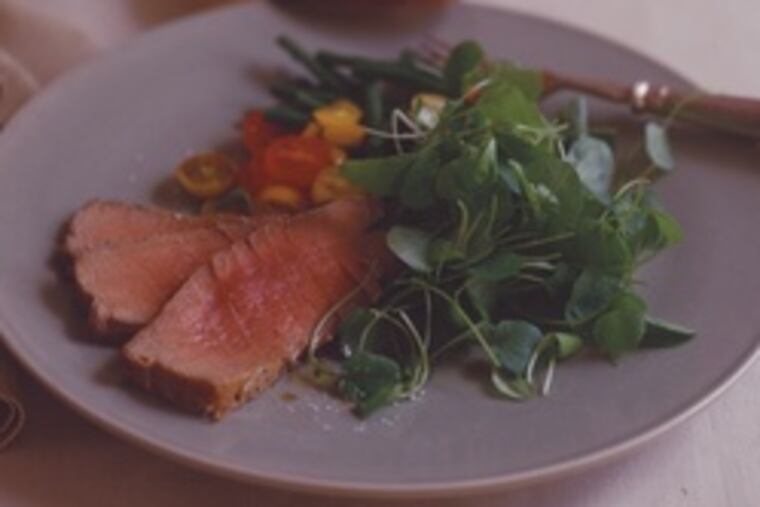 Seared tuna is paired with watercress, green beans and tomatoes. Meats and cheeses also are options.