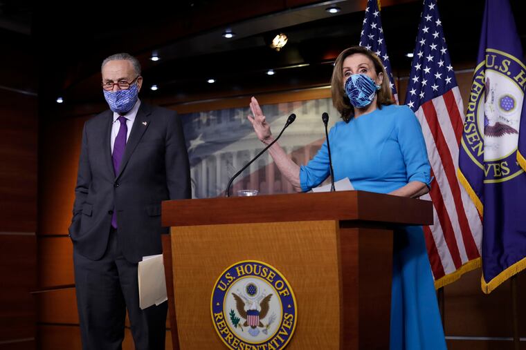 U.S. House Speaker Nancy Pelosi (D-CA) speaks during a joint press conference with Senate Minority Leader Chuck Schumer (D-NY) on Capitol Hill in Washington on November 12, 2020.