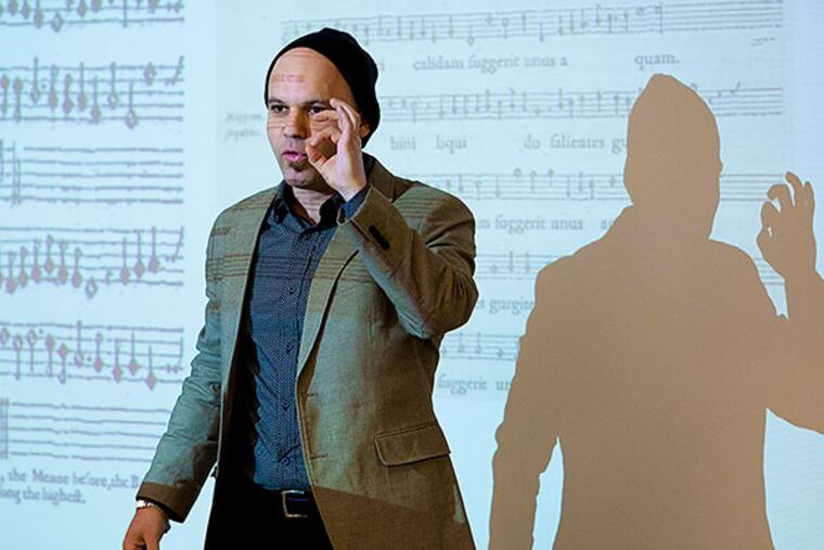 Loren Ludwig of the Peabody Institute of Johns Hopkins University speaks about the music of the 1617 alchemy text "Atalanta Fugiens" at the Chemical Heritage Foundation on Saturday. JEFF FUSCO