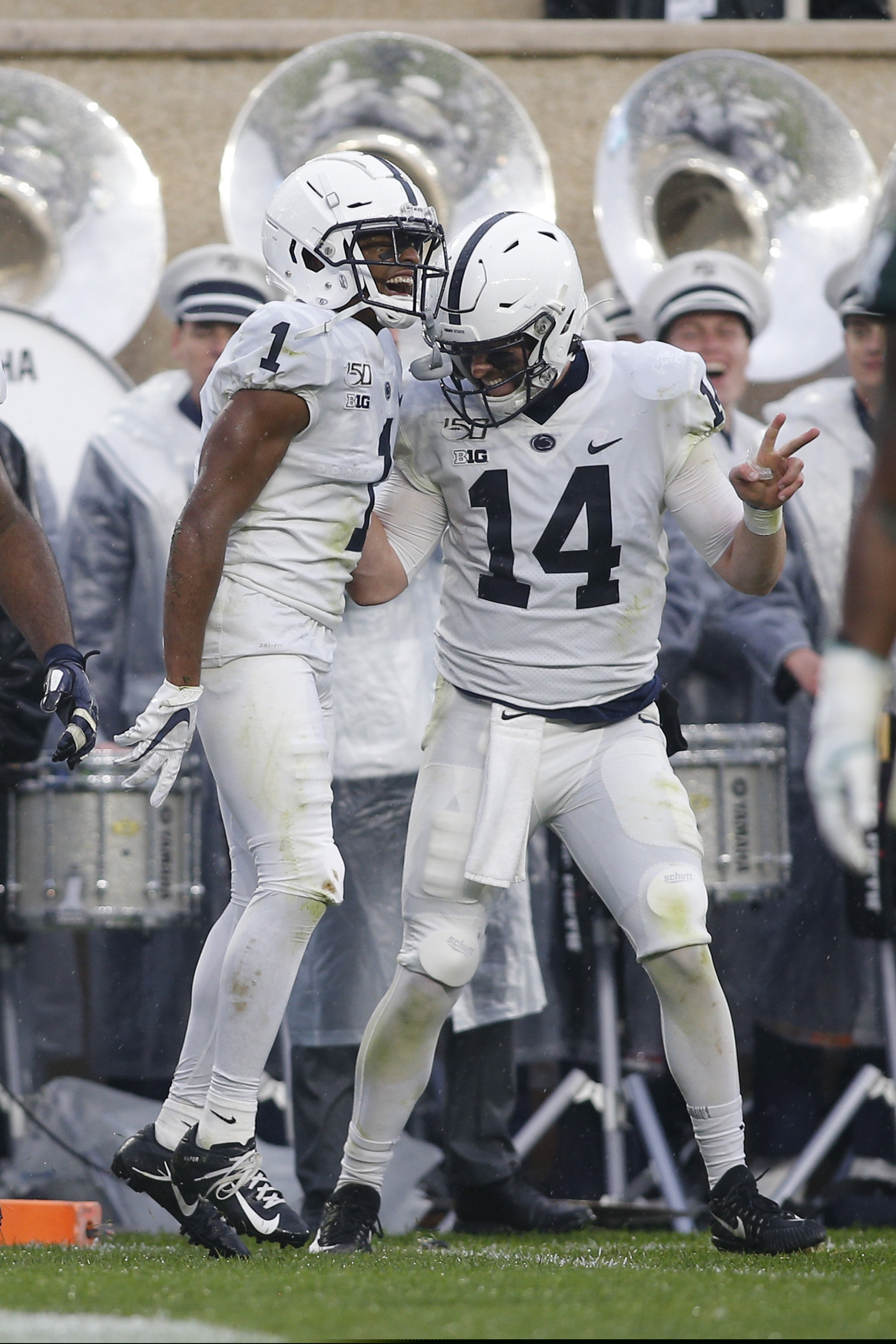 Penn State receiver KJ Hamler, left, and quarterback Sean Clifford (14) celebrating Hamler's touchdown reception against Michigan State on Oct. 26.