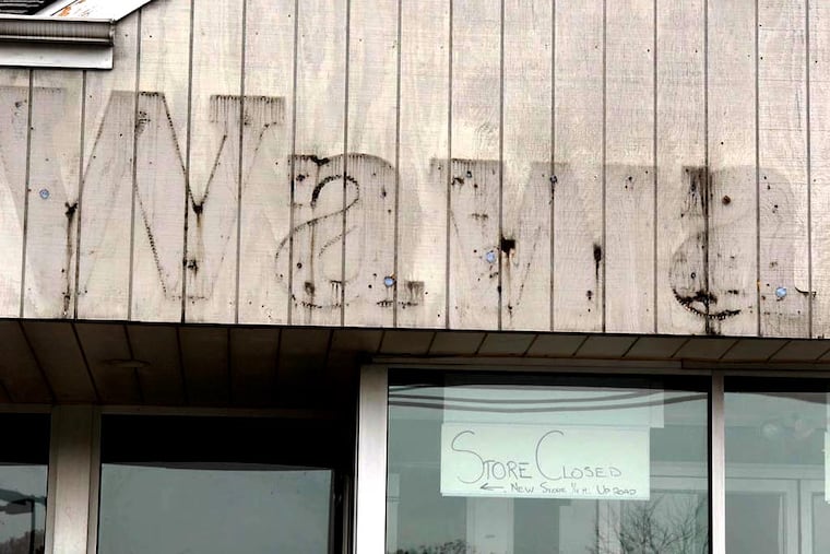 This file photograph shows a fading sign on a former Wawa store on Haddonfield Road in Pennsauken. Two Northeast Philadelphia stores that Wawa plans to close this month will join a list of at least 11 Philadelphia locations the company has closed since 2020.