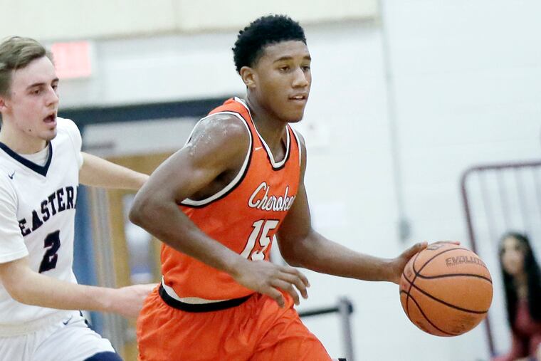 Damian Smith (right) had 13 points in Cherokee’s 53-47 win over Toms River North.