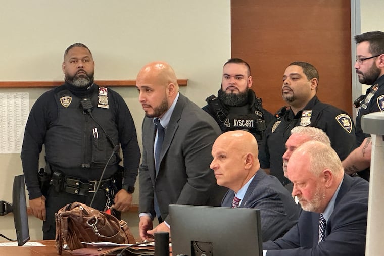Former New York City police Sgt. Erik Duran stands during his April 9 sentencing hearing at the Bronx County Hall of Justice.