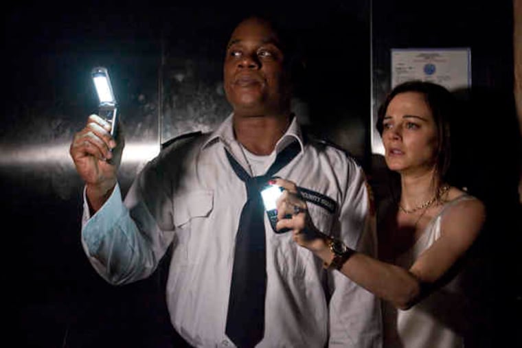 Bokeem Woodbine (left) and Bojana Novakovic in "Devil," the supernatural scare film advertised as "from the mind of M. Night Shyamalan."