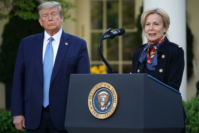 Deborah Birx, right, speaks as President Donald Trump listens during a briefing on COVID-19 in April 2020.