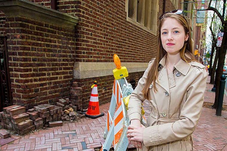 Victoria Harris, a transportation and urban planner, created the Twitter account @AwarenessCone, which calls attention to problems that need to be fixed, not just marked with a safety cone. (JEFF FUSCO / FOR THE DAILY NEWS)
