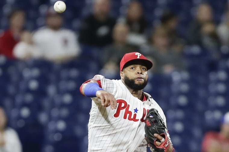 Carlos Santana throwing to first during a start at third base against the Marlins last Friday.