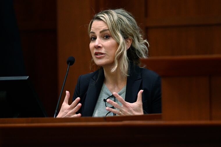 Clinical and forensic psychologist Dr. Shannon Curry testifies on Tuesday in a Fairfax County Circuit Court courtroom in Fairfax, Va., during the libel trial between actor Johnny Depp and his ex-wife actress Amber Heard.