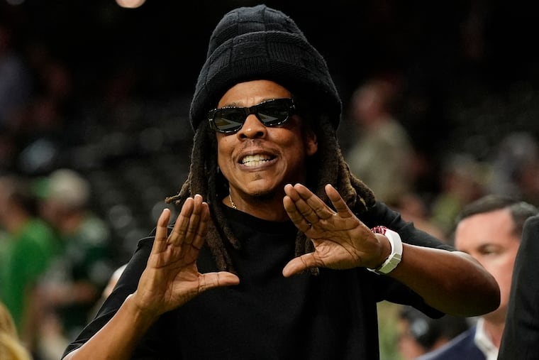 Jay-Z at Super Bowl LIX between the Eagles and the Kansas City Chiefs in New Orleans in 2025. The rapper is headlining the Roots Picnic at Belmont Plateau this weekend, with the Philly hip-hop group as his backing band. (AP Photo/Frank Franklin II)