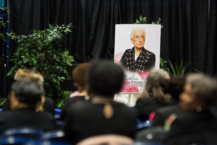 A portrait of NASA mathematician Katherine Johnson faces guests prior to a memorial service in her honor on Saturday, March 7, 2020, at Hampton University Convocation Center in Hampton, Va. Johnson, a mathematician who calculated rocket trajectories and earth orbits for NASA’s early space missions and was later portrayed in the 2016 hit film “Hidden Figures,” about pioneering black female aerospace workers died on Monday, Feb. 24, 2020. She was 101.