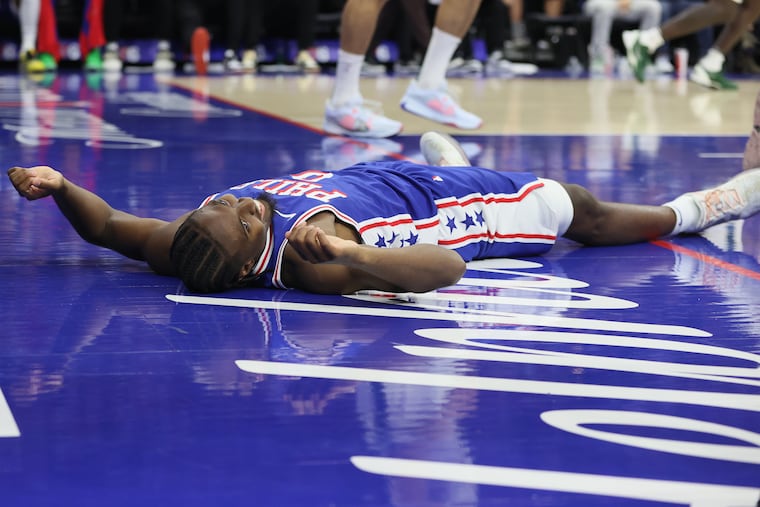 Tyrese Maxey of the Sixers reacts after falling during a drive to the basket against the Bucks on Oct. 23.