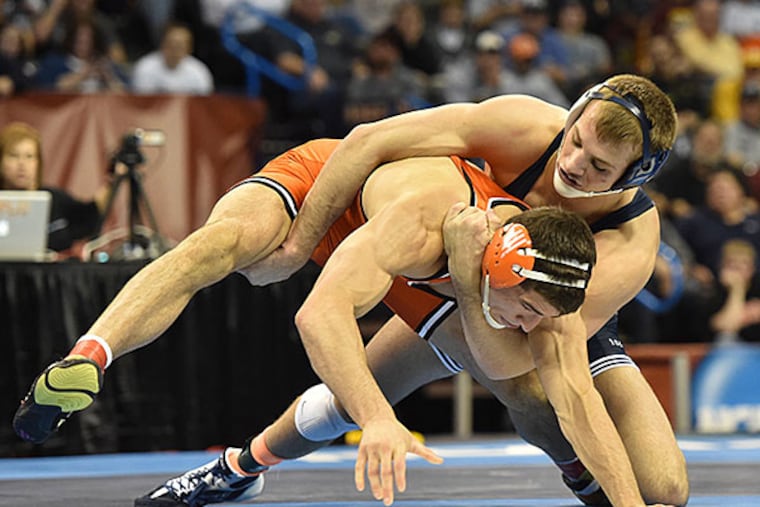 Penn State's David Taylor (top). (Photo courtesy of Penn State)