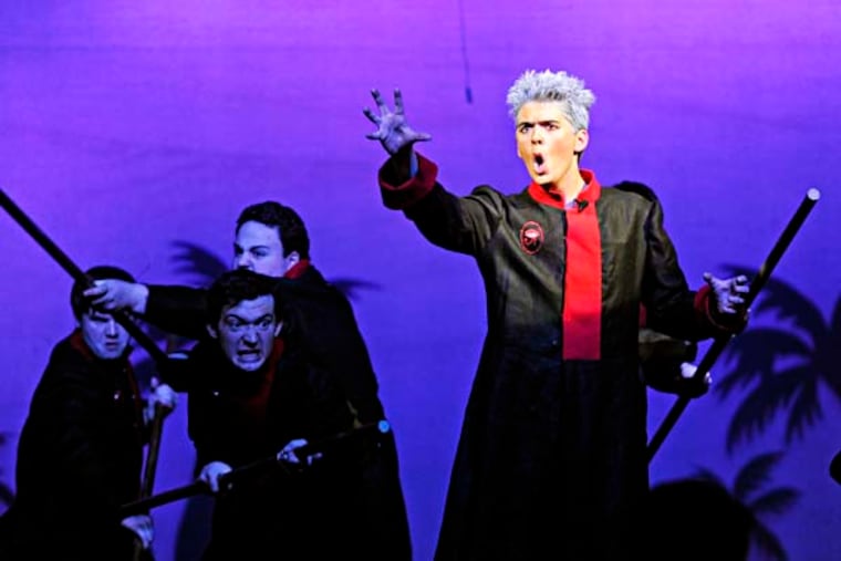 Sophomore Jack Tremper as Zoser performs with the cast on stage during dress rehearsal for Cherry Hill East's musical Aida February 26, 2014. ( TOM GRALISH / Staff Photographer )