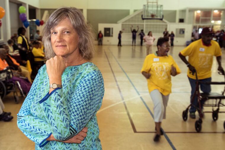 Diane Menio, executive director of the CARIE, at the organization’s annual Golden Games, a day of competition between residents of senior care facilities. (MATTHEW HALL/For The Inquirer)