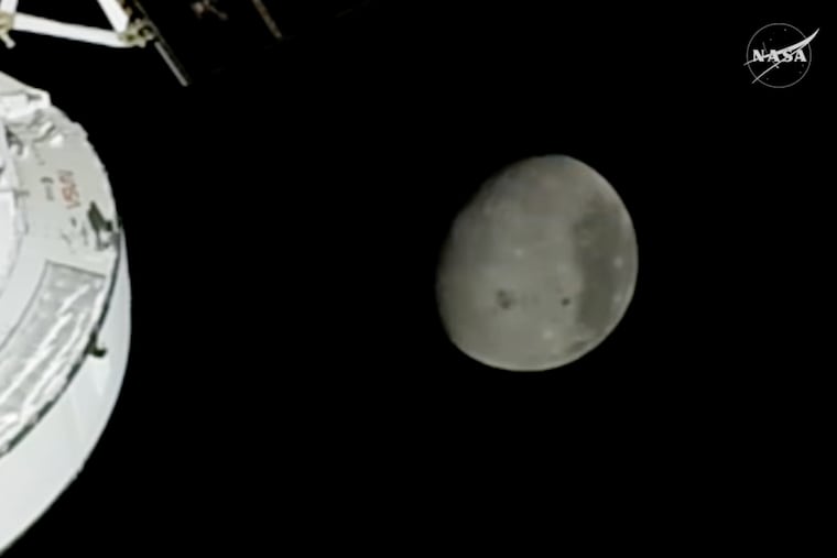In this image from video provided by NASA, the Moon is seen from a camera outside the Orion Spacecraft after the Artemis II astronauts surpassed the farthest distance ever traveled by humans from Earth, Monday, April 6, 2026.
