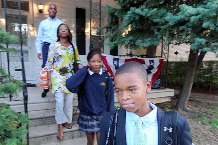 The family heads off to school and work. Steven Lindner says of his son: "No matter where he goes, there's a perception: He's the black kid."