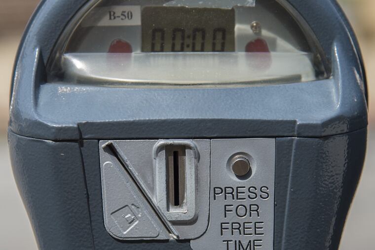 Free parking in the city for holiday shopping? Not such a great idea. CLEM MURRAY / Staff Photographer