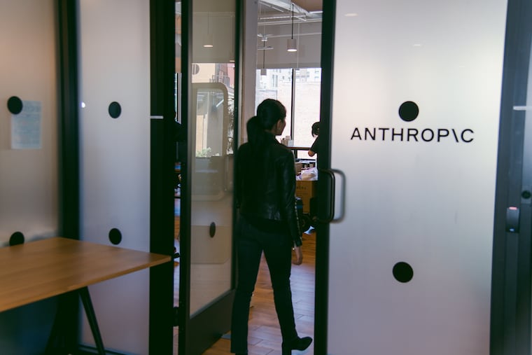 An employee enters the Anthropic office in San Francisco, June 7, 2023. Anthropic is one of the funders of the new nonprofit Raise Us that aims to help American workers transition to the new era of artificial intelligence.