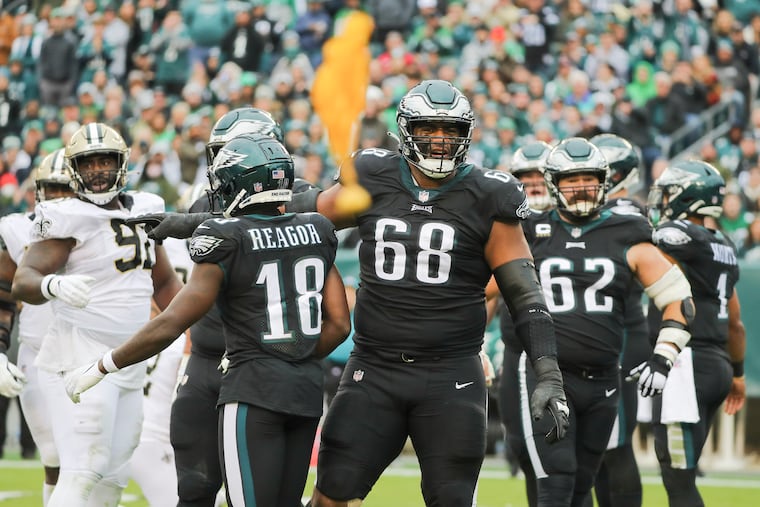 The key to the Eagles' success in 2022 remains the offensive line, including tackle Jordan Mailata (68) and center Jason Kelce (62).