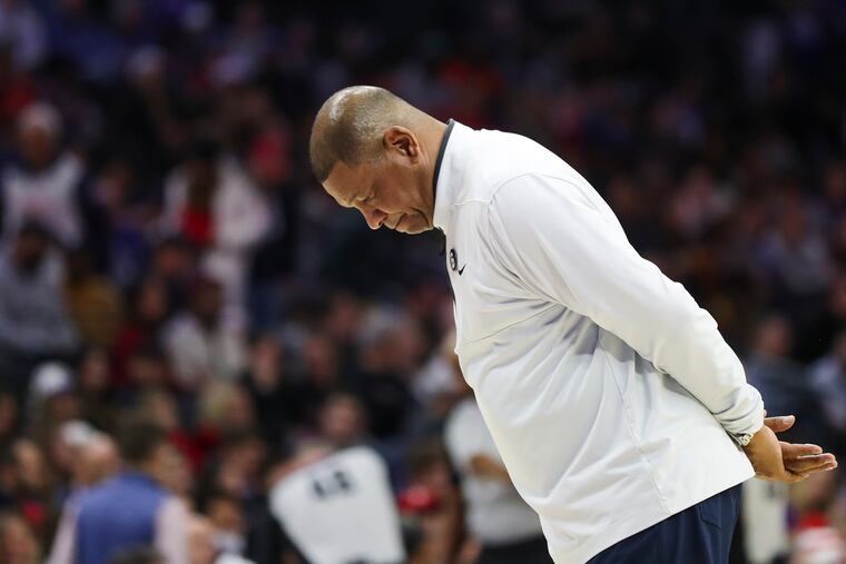 Sixers head coach Doc Rivers looks down during a timeout of a game against the Detroit Pistons at the Wells Fargo Center in Philadelphia on Wednesday, Dec. 21, 2022.