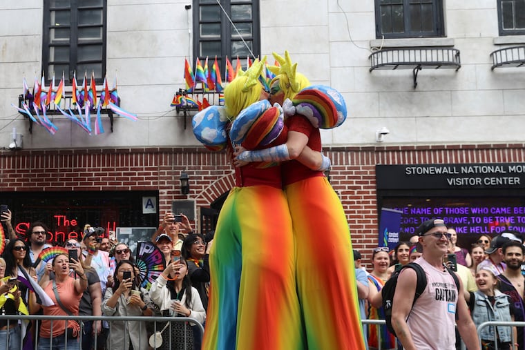 Parade-goers attend the NYC Pride March near the Stonewall Inn, Sunday, June 28, 2026, in New York.