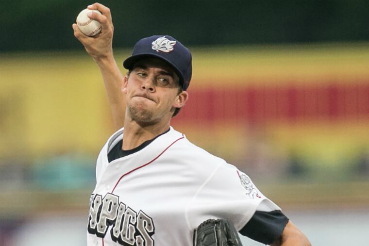 Aaron Nola delivers a pitch in his debut for the Triple A IronPigs. (Steven M. Falk / Staff Photographer)