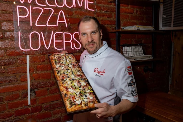 Davide Lubrano of Pizzata Pizzeria and Pizzata Birreria with his award-winning Roman pizza.